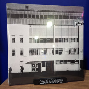 NOW PLAYING LP STAND REAL GROOVY LOGO