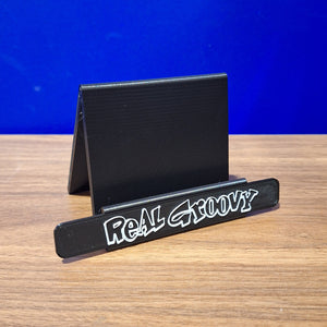 NOW PLAYING LP STAND REAL GROOVY LOGO