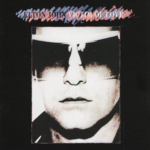 ELTON JOHN | VICTIM OF LOVE