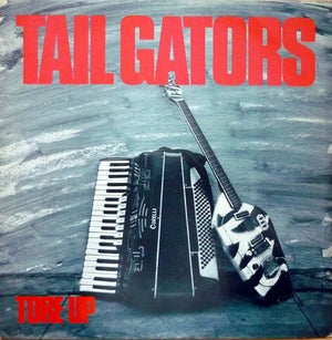 TAIL GATORS | TORE UP