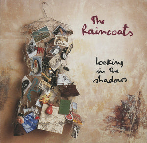 RAINCOATS | LOOKING IN THE SHADOWS