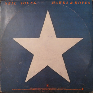 NEIL YOUNG | HAWKS AND DOVES - MEXICAN PRESSING - HOLE PUNCH IN COVER