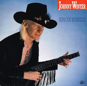 JOHNNY WINTER | SERIOUS BUSINESS - STAMP AND WRITING ON COVER - STAMP ON LABEL