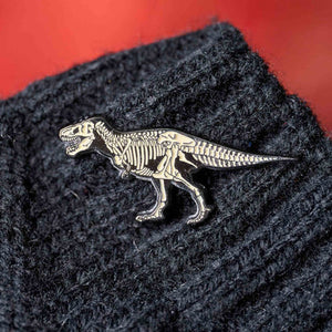 TYRANNOSAURUS SKELETON ENAMEL BADGE PIN GLOWS IN DARK