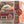 PORNO FOR PYROS | PYROTECHNICS - PORNO FOR PYROS LATEST AND GREATEST (CLEAR ORANGE SPLATTER EDITION) (VINYL)