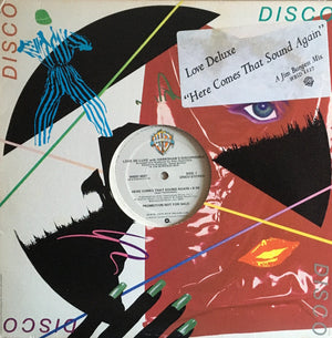 LOVE DELUXE | HERE COMES THAT SOUND AGAIN - 12 - COMPANY SLEEVE WITH HYPE - SLEEVE BIT ROUGH