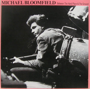 MICHAEL BLOOMFIELD | BETWEEN THE HARD PLACE AND THE GROUND - US